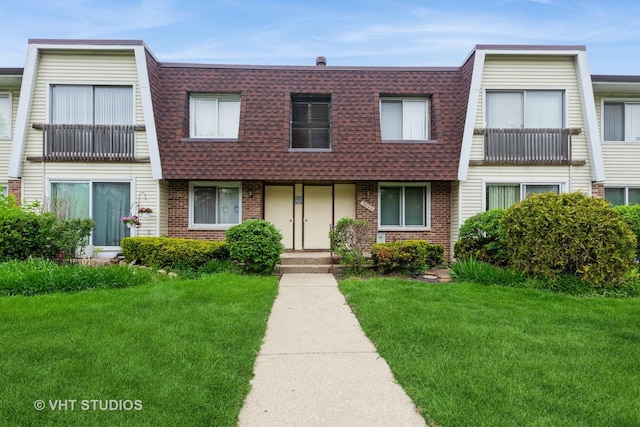 3026 Roberts Dr Unit 4, Woodridge, IL 60517 - hallway featuring baseboards and light wood-style floors