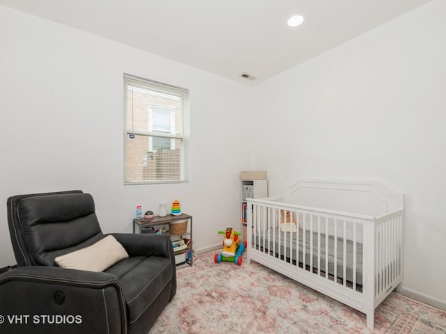 3004 N Olcott Ave, Chicago, IL 60707 - bedroom featuring baseboards, a crib, and recessed lighting