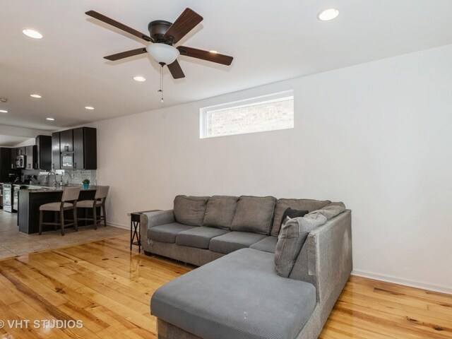 3004 N Olcott Ave, Chicago, IL 60707 - living area with recessed lighting, light wood-style floors, ceiling fan, and baseboards