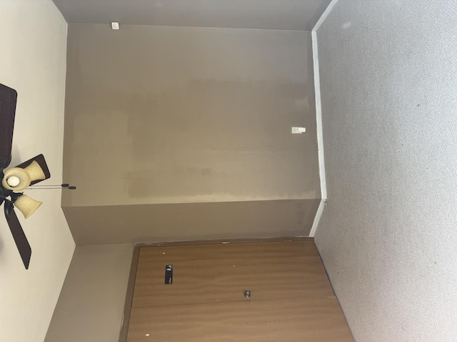 spare room featuring wood finished floors