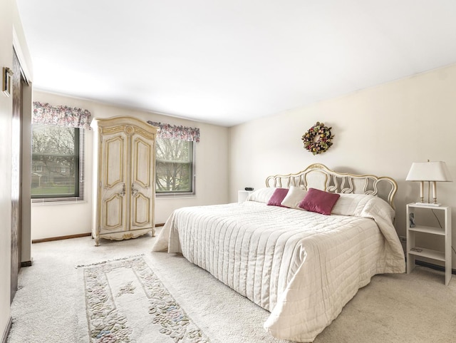1602 S Surrey Ln, Arlington Heights, IL 60005 - bedroom with baseboards and light carpet