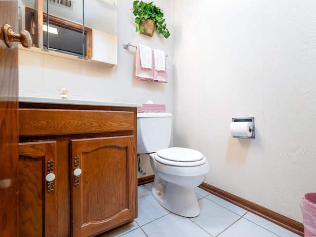 1602 S Surrey Ln, Arlington Heights, IL 60005 - bathroom with visible vents, tile patterned floors, baseboards, vanity, and toilet