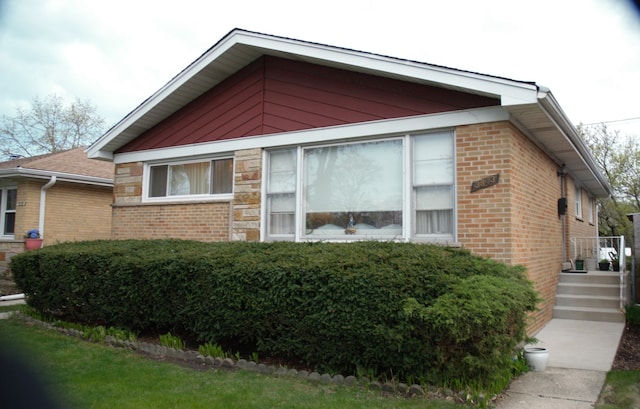 3843 Dempster St, Skokie, IL 60076 - view of property exterior featuring brick siding