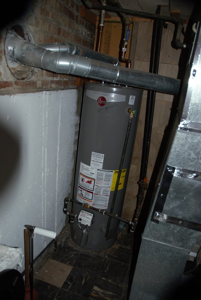3843 Dempster St, Skokie, IL 60076 - utility room with gas water heater