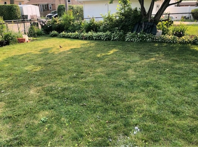 3843 Dempster St, Skokie, IL 60076 - view of yard featuring fence