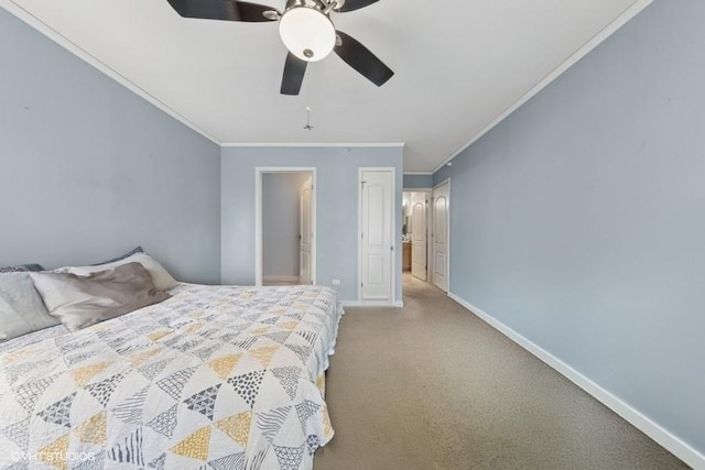 bedroom featuring ornamental molding, baseboards, carpet, and a ceiling fan