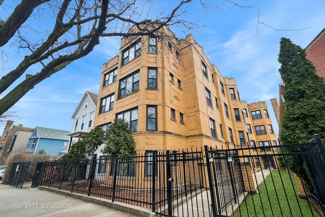 view of property featuring a fenced front yard