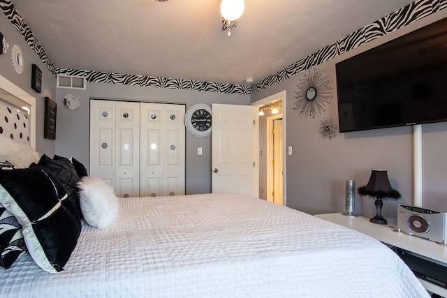 695 Cassandra Ln, University Park, IL 60466 - bedroom featuring a closet and visible vents