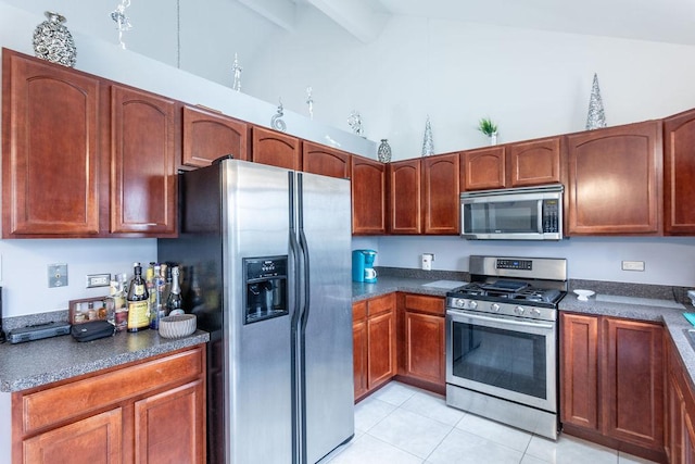 695 Cassandra Ln, University Park, IL 60466 - kitchen with light tile patterned flooring, dark countertops, appliances with stainless steel finishes, and lofted ceiling with beams