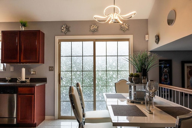 695 Cassandra Ln, University Park, IL 60466 - dining room with a notable chandelier and light tile patterned floors