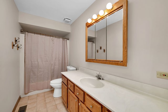 bathroom featuring toilet, visible vents, a shower with shower curtain, and vanity
