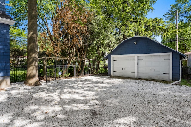 detached garage with fence