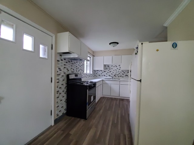 120 Grow Ln, Streamwood, IL 60107 - kitchen with freestanding refrigerator, dark wood-type flooring, white cabinets, backsplash, and gas stove