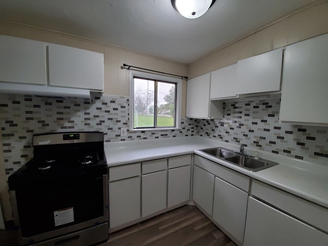 120 Grow Ln, Streamwood, IL 60107 - kitchen with stainless steel gas range, a sink, light countertops, white cabinetry, and backsplash