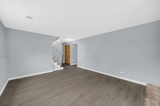 9 Shilling Ct, Bolingbrook, IL 60440 - unfurnished living room with baseboards, stairs, wood finished floors, and visible vents