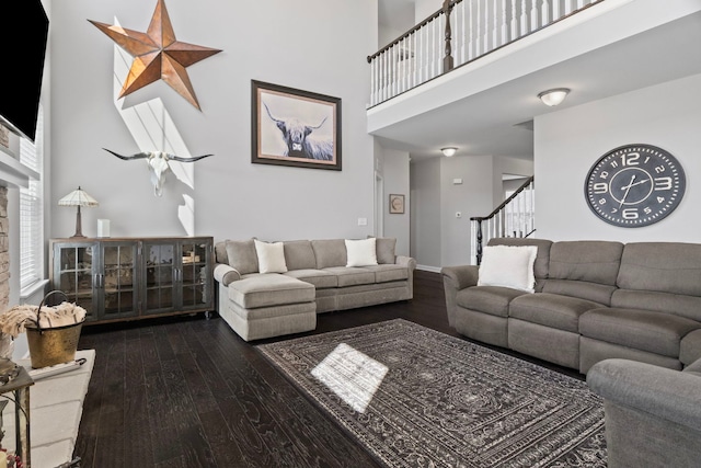 27025 Ashgate Xing, Plainfield, IL 60585 - living area with a high ceiling, hardwood / wood-style flooring, and stairs