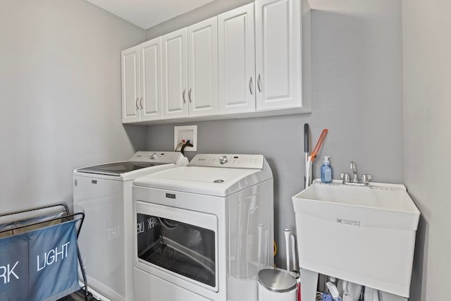 27025 Ashgate Xing, Plainfield, IL 60585 - clothes washing area featuring cabinet space and washing machine and clothes dryer