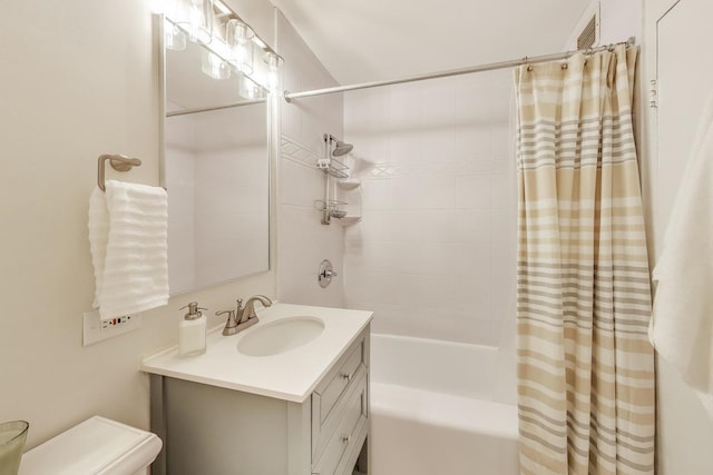 bathroom featuring vanity, toilet, shower / bathtub combination with curtain, and visible vents