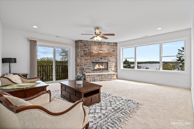 4520 W Shore Dr, Wonder Lake, IL 60097 - carpeted living area with a ceiling fan, plenty of natural light, a fireplace, and recessed lighting
