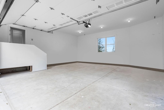 4520 W Shore Dr, Wonder Lake, IL 60097 - garage with a garage door opener and baseboards