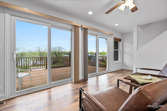 4520 W Shore Dr, Wonder Lake, IL 60097 - living room with wood finished floors, a ceiling fan, recessed lighting, and baseboards