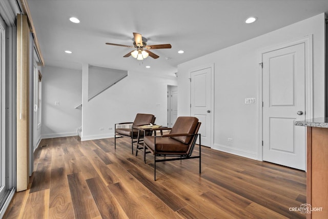 4520 W Shore Dr, Wonder Lake, IL 60097 - sitting room featuring ceiling fan, dark wood-style floors, recessed lighting, baseboards, and stairs
