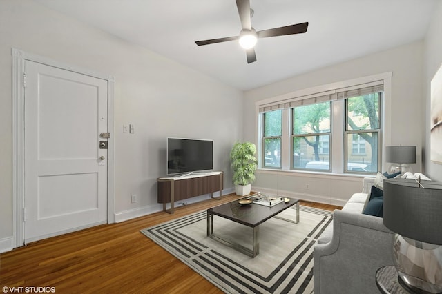 3903 N Claremont Ave Unit 1, Chicago, IL 60618 - living area with wood finished floors, ceiling fan, and baseboards