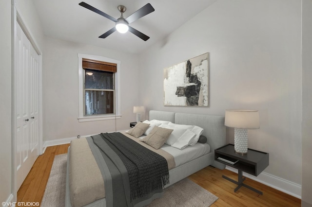 3903 N Claremont Ave Unit 1, Chicago, IL 60618 - bedroom with a closet, wood finished floors, baseboards, and a ceiling fan
