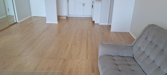7234 W N Ave Unit 514, Elmwood Park, IL 60707 - living room with light wood-type flooring and baseboards