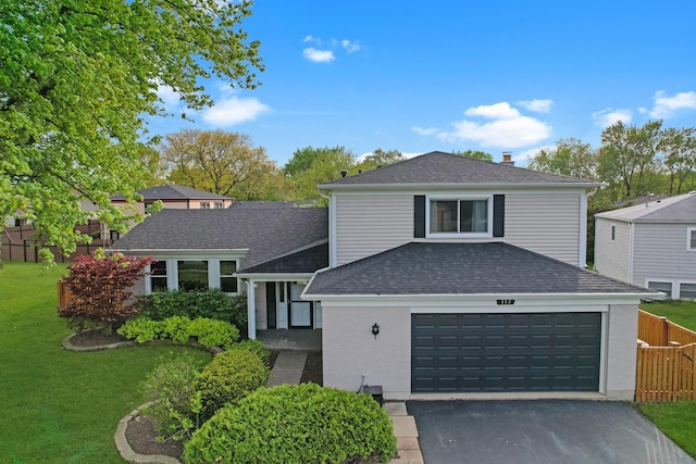 353 Marian Ct, Bolingbrook, IL 60440 - view of front of property with a shingled roof, driveway, a chimney, brick siding, and a garage