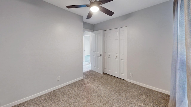 353 Marian Ct, Bolingbrook, IL 60440 - unfurnished bedroom with carpet, baseboards, a closet, and ceiling fan