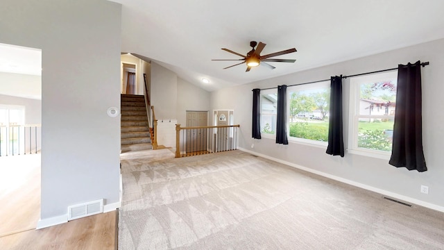 353 Marian Ct, Bolingbrook, IL 60440 - unfurnished room featuring ceiling fan, lofted ceiling, baseboards, and light colored carpet