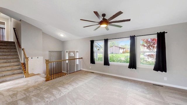 353 Marian Ct, Bolingbrook, IL 60440 - carpeted spare room featuring a ceiling fan, vaulted ceiling, baseboards, and stairway