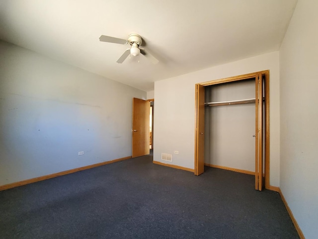 unfurnished bedroom with a closet, a ceiling fan, baseboards, and visible vents