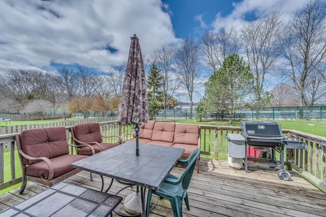 wooden terrace with outdoor dining space and an outdoor living space
