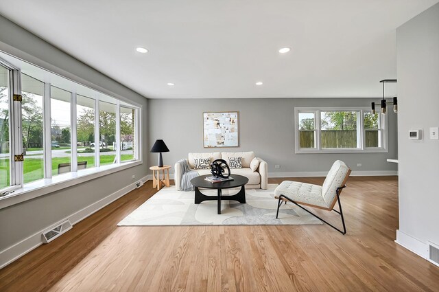 6340 Willow Springs Rd, La Grange Highlands, IL 60525 - living room with healthy amount of natural light, baseboards, wood finished floors, and recessed lighting