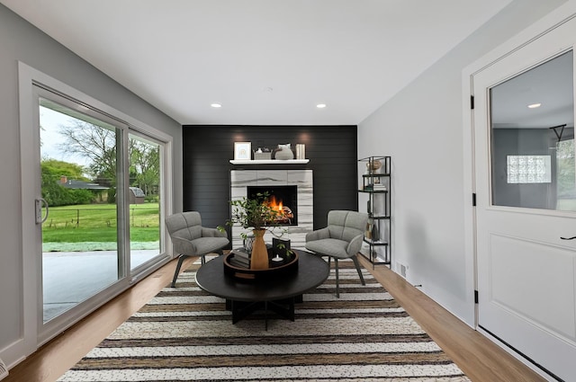 6340 Willow Springs Rd, La Grange Highlands, IL 60525 - living area with light wood-style flooring, recessed lighting, and a warm lit fireplace