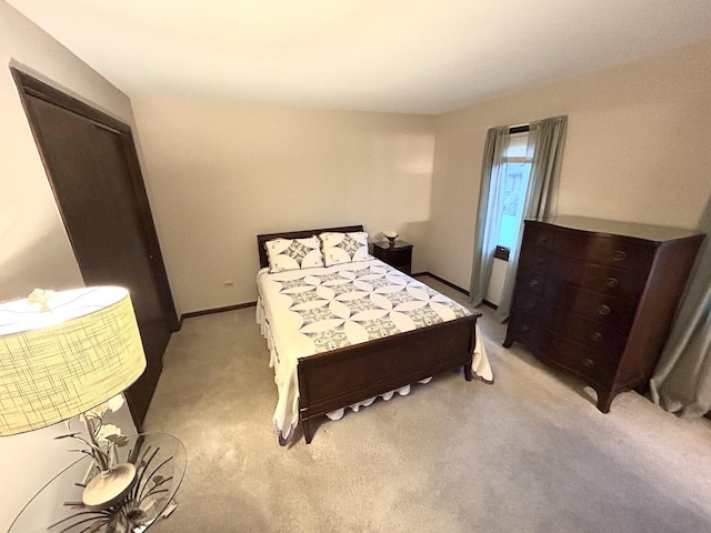 bedroom with light carpet