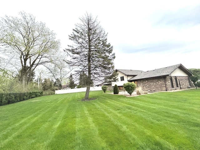 view of yard with fence