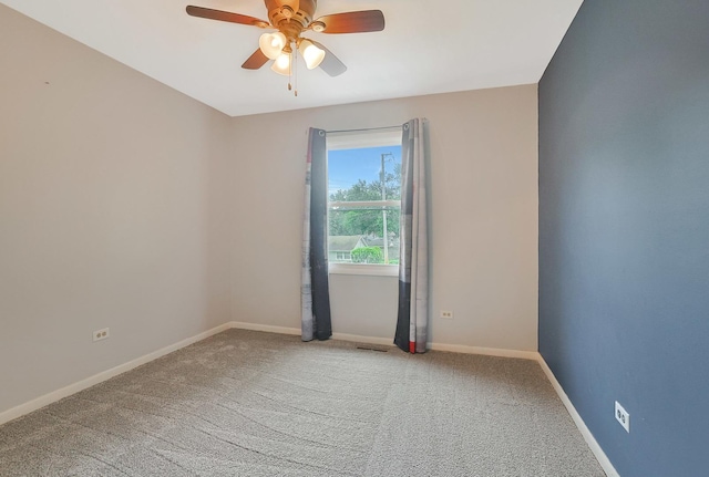 3110 Still Hill Dr, Mchenry, IL 60050 - spare room featuring carpet floors and a ceiling fan