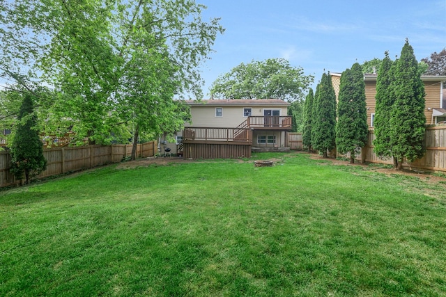 3110 Still Hill Dr, Mchenry, IL 60050 - fenced backyard featuring a deck and an outdoor fire pit