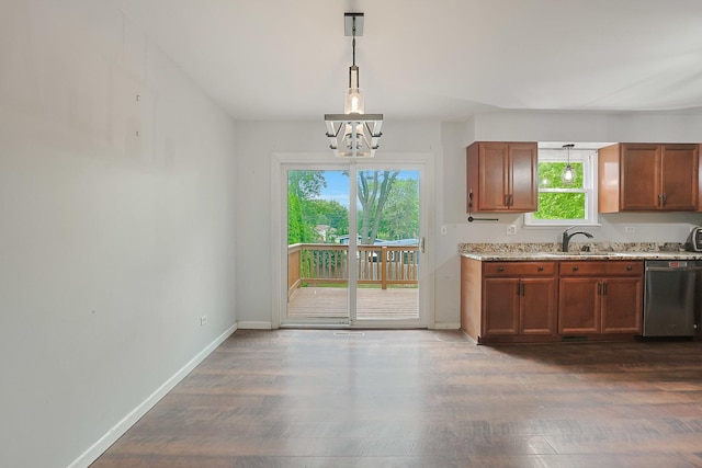 3110 Still Hill Dr, Mchenry, IL 60050 - kitchen featuring stainless steel dishwasher, a chandelier, dark wood-style floors, and brown cabinetry