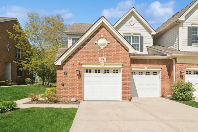 15 Red Tail Dr, Hawthorn Woods, IL 60047 - view of front of property featuring driveway, a front lawn, brick siding, a shingled roof, and a garage