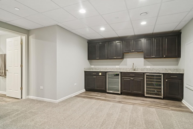 15 Red Tail Dr, Hawthorn Woods, IL 60047 - indoor wet bar with wine cooler, light carpet, baseboards, recessed lighting, and a drop ceiling