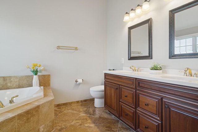 15 Red Tail Dr, Hawthorn Woods, IL 60047 - bathroom with double vanity, toilet, a garden tub, and baseboards