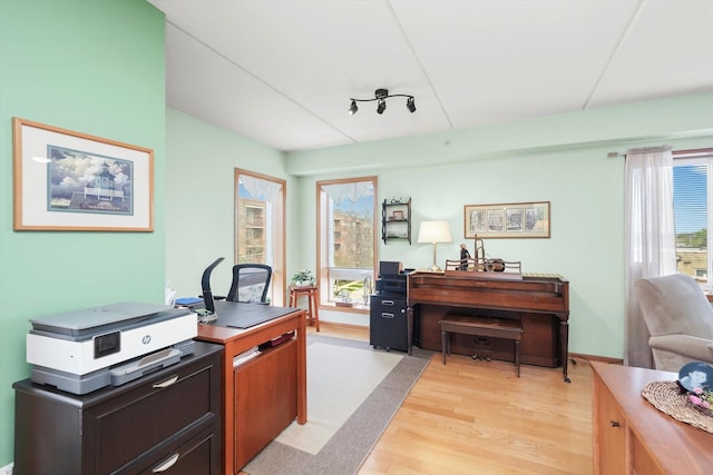 office space featuring light wood-style flooring