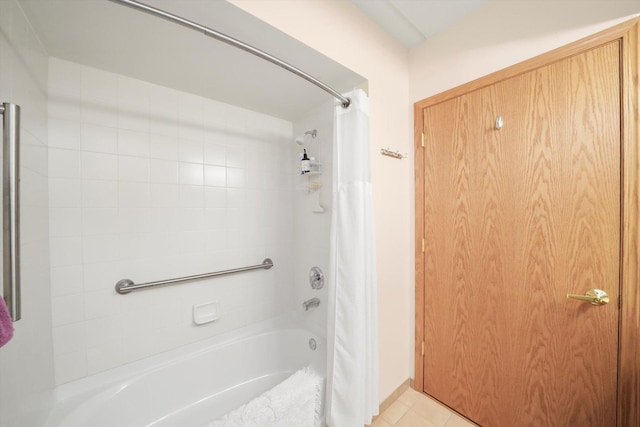 bathroom featuring tile patterned flooring and shower / bath combo with shower curtain