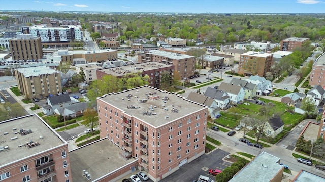 birds eye view of property with a view of city