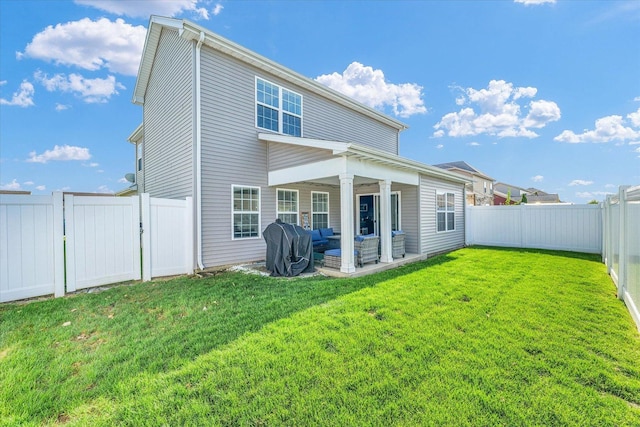 back of property with a patio area and outdoor lounge area