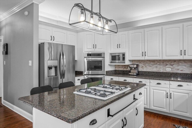 1759 Baybrook Ln, Naperville, IL 60564 - kitchen featuring stainless steel appliances, dark wood-type flooring, white cabinets, and crown molding